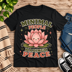 Minimal People Premium T-Shirt in vintage black, flat lay with smiling lotus flower and "Minimal People Maximum Peace" graphic