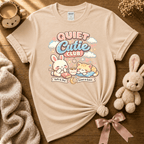 Quiet Cutie 1 cute animal graphic t-shirt displayed in a cozy flat lay in natural.