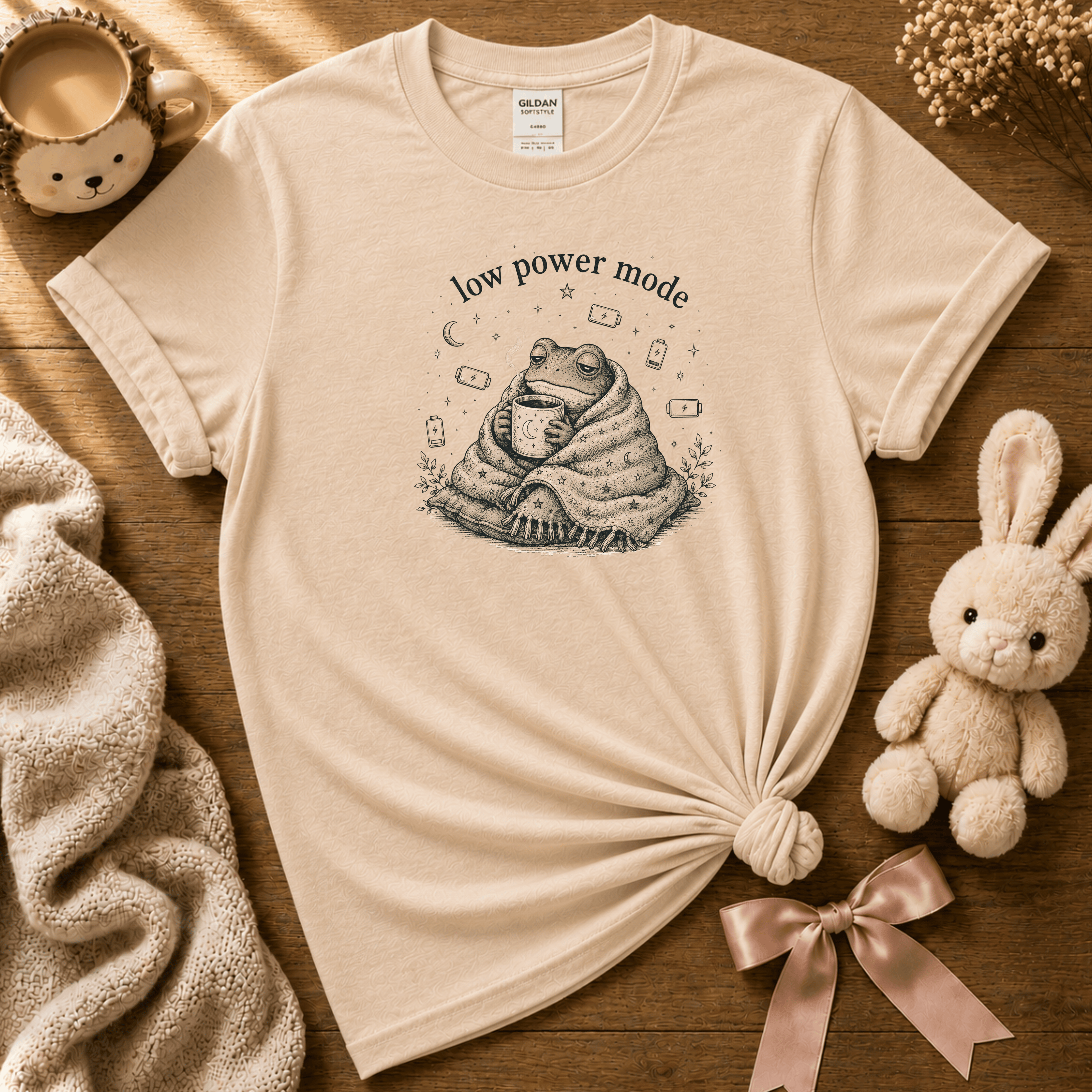 Low Power Mode introvert graphic t-shirt displayed in a cozy flat lay in natural.