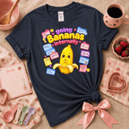 Going Bananas Kawaii cute fruit graphic t-shirt displayed in a cozy flat lay in navy.