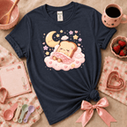 Sleeping toast Kawaii graphic t-shirt cozy flat lay in navy.