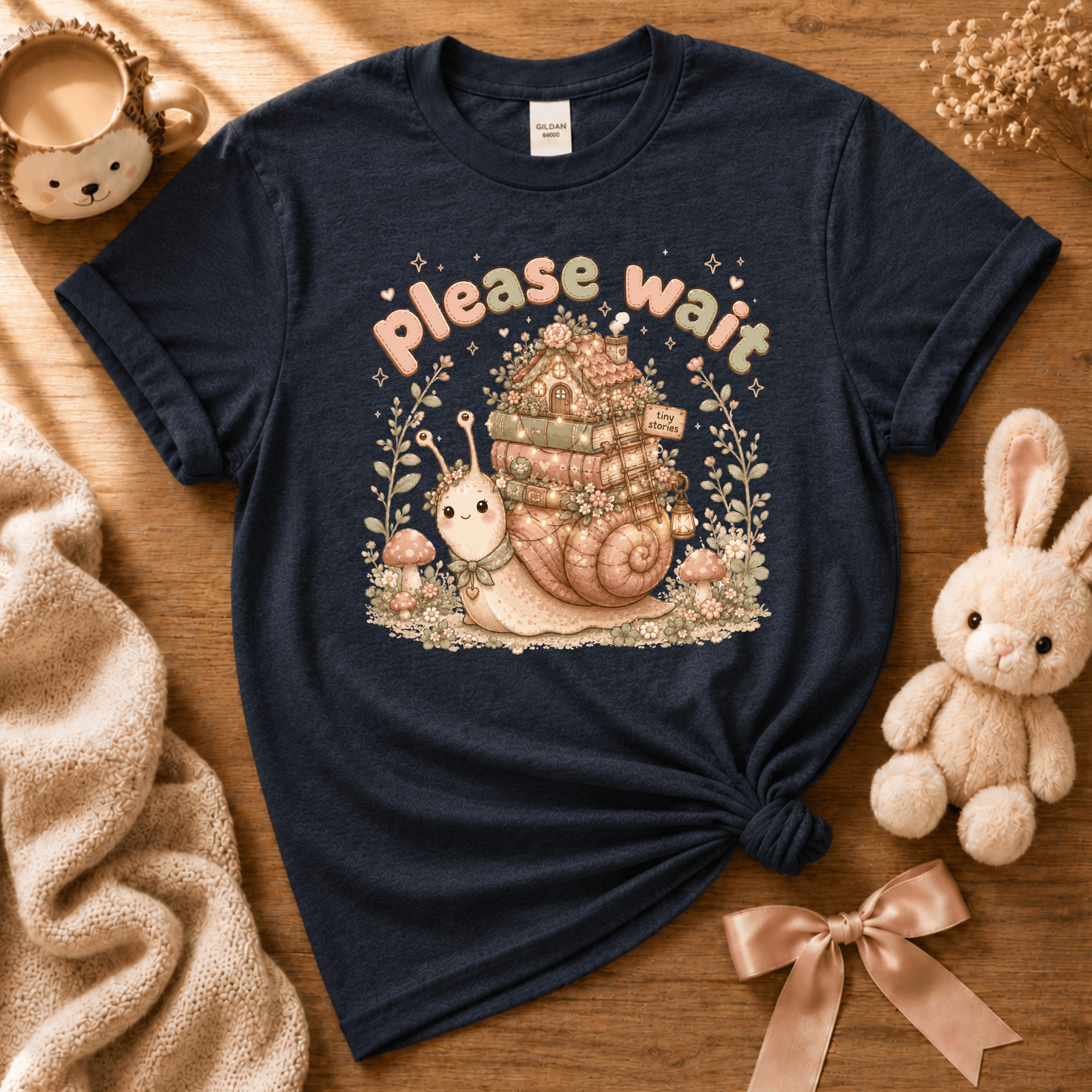 Please wait cottagecore graphic t-shirt cozy flat lay in navy.
