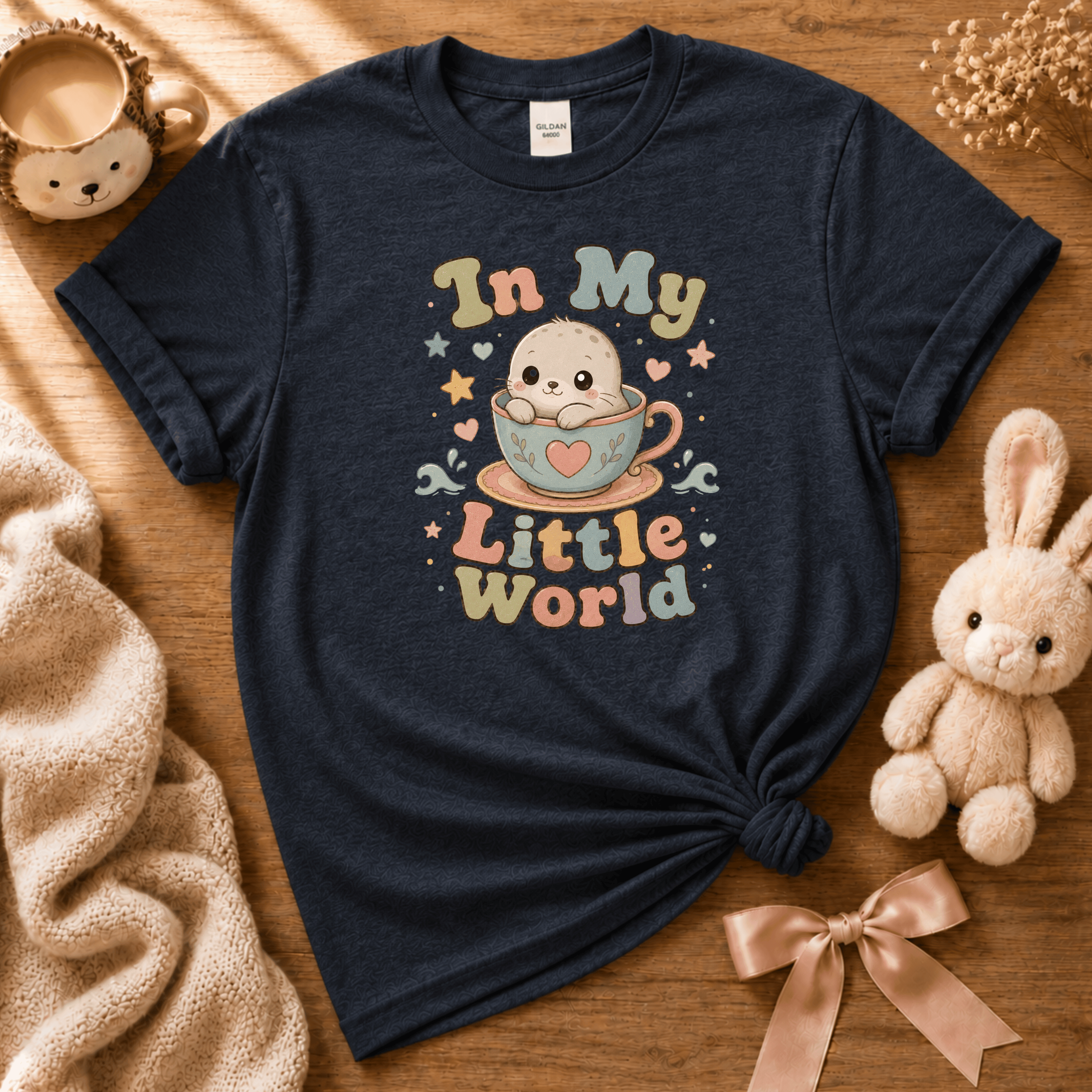 In My Little World cute animal graphic t-shirt cozy flat lay in navy.