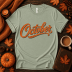 October Premium T-Shirt in sage, flat lay with autumn props