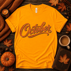 October Premium T-Shirt in gold, flat lay with autumn props