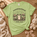 Overstimulated cute animal graphic t-shirt cozy flat lay in pistachio green.