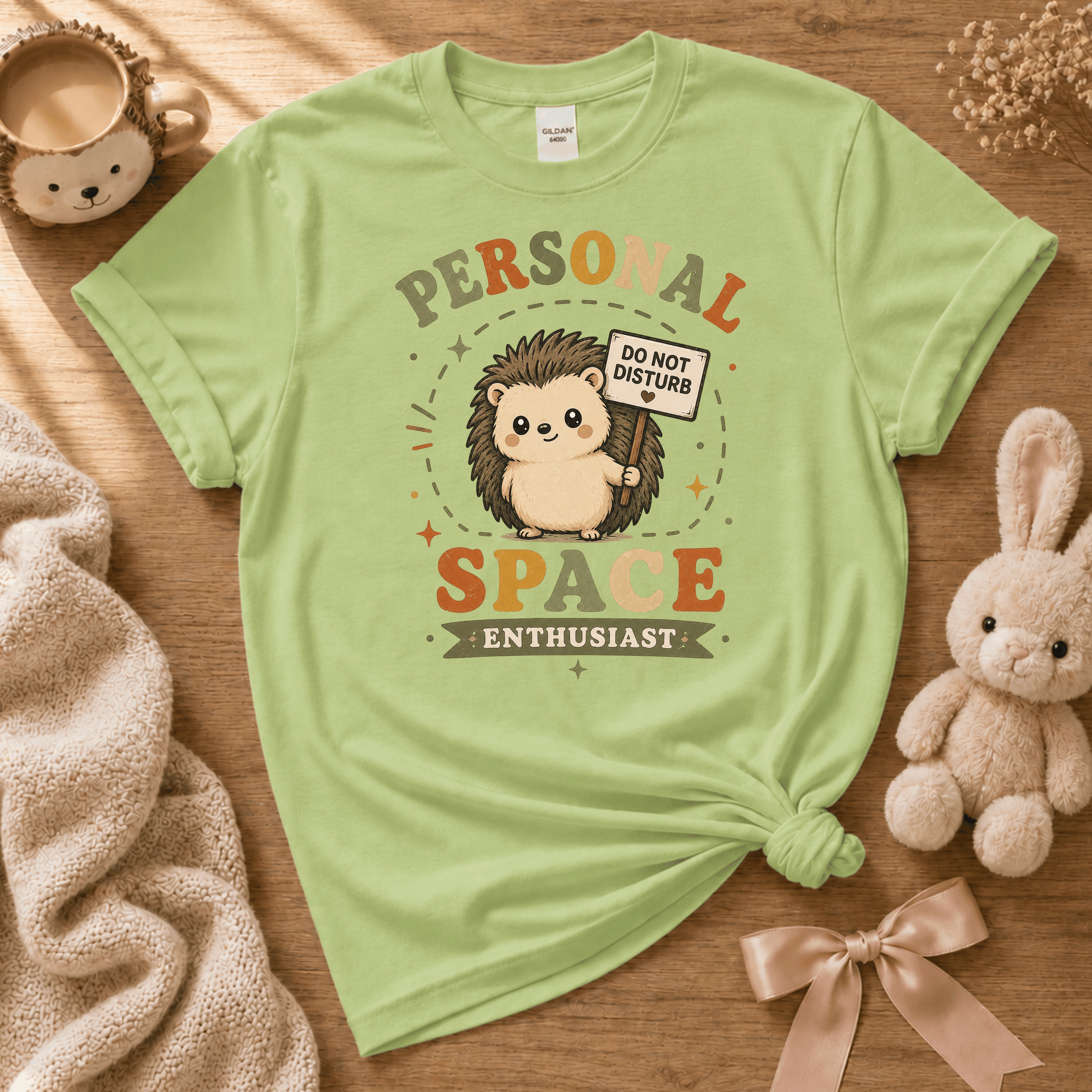 Personal Space Enthusiast cute animal graphic t-shirt cozy flat lay in pistachio green.