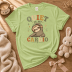 Quiet is My Cardio cute animal graphic t-shirt displayed in a cozy flat lay in pistachio green.