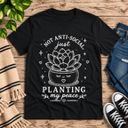 Planting My Peace Premium T-Shirt in vintage black, flat lay