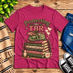 Protecting My TBR Premium T-Shirt in berry, flat lay