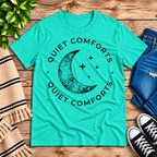Quiet Comforts Dark Premium T-Shirt in heather sea green, flat lay with crescent moon and "Quiet Comforts" circular text graphic