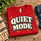 Quiet Mode Premium T-Shirt in red, folded close-up with neck tag showing