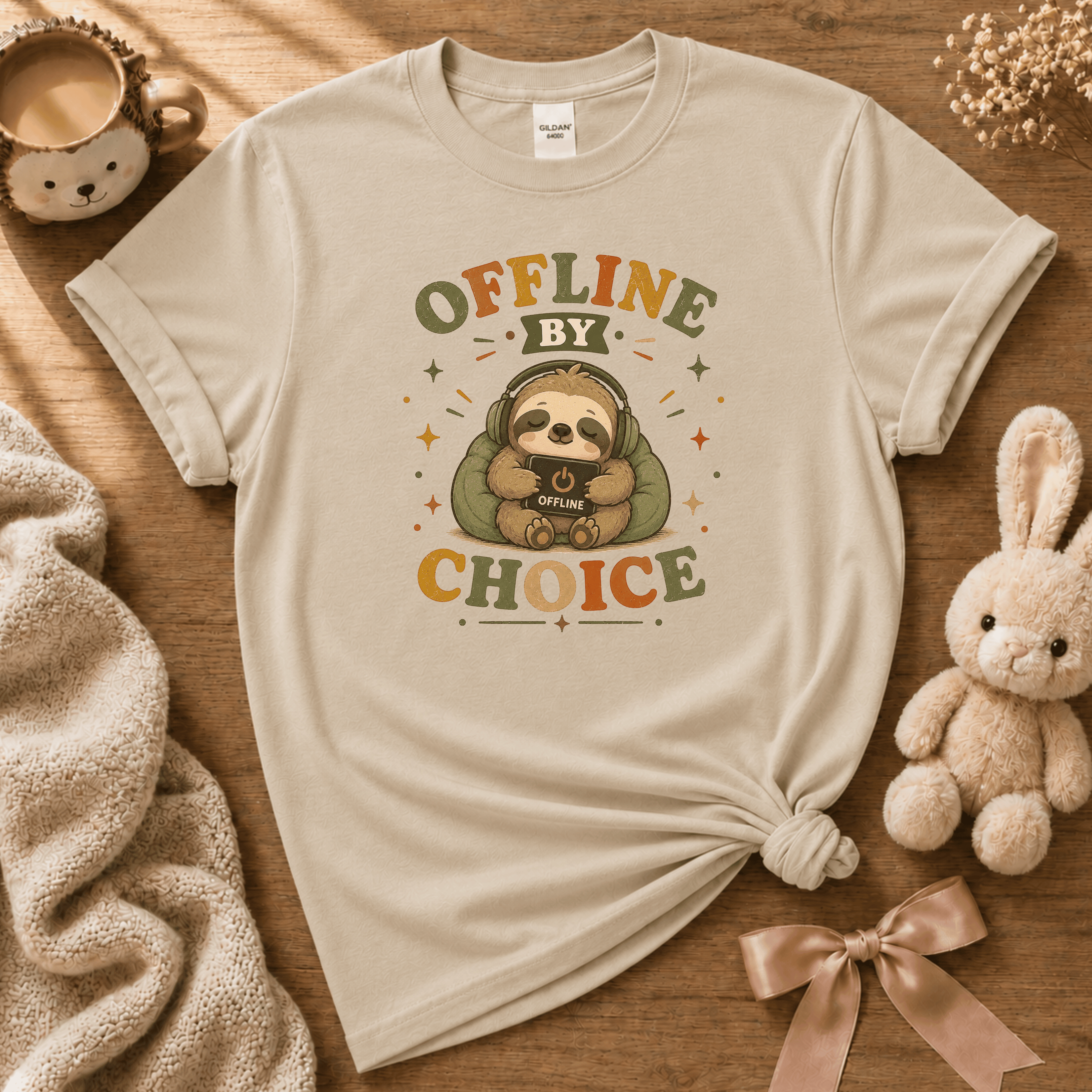 Offline By Choice cute animal graphic t-shirt cozy flat lay in sand.