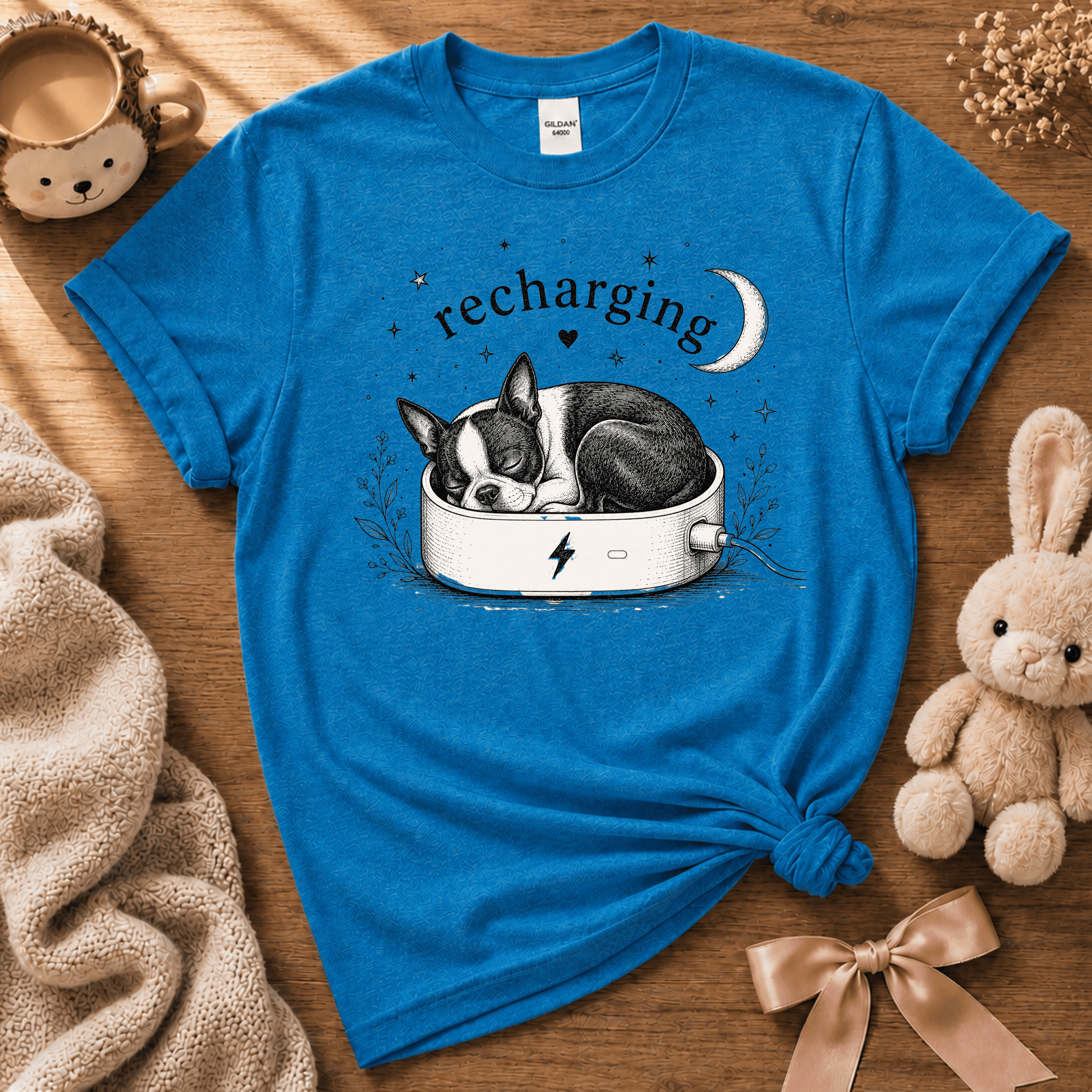 Recharging Boston cute animal graphic t-shirt displayed in a cozy flat lay in sapphire.