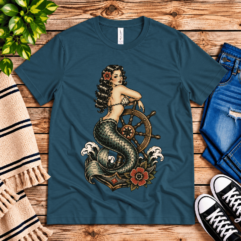Ship Wheel Mermaid Premium T-Shirt in deep teal, flat lay