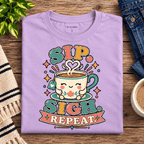 Sip. Sigh. Repeat. Premium T-Shirt in lilac, folded close-up with neck tag showing