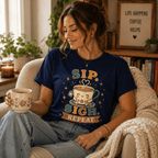Woman holding a mug, wearing the Sip. Sigh. Repeat. Premium T-Shirt in navy