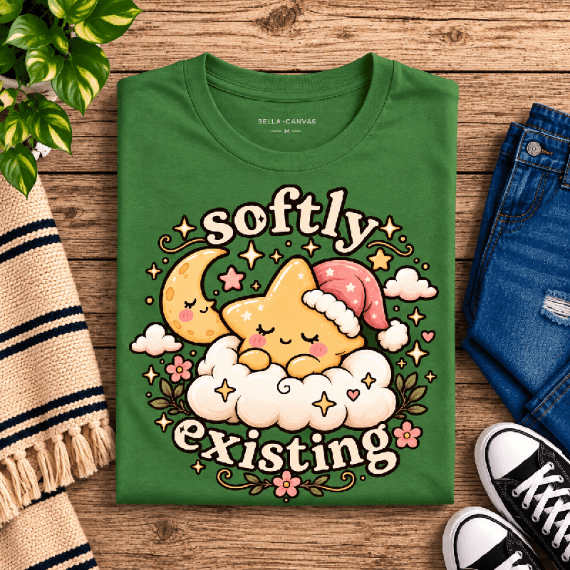 Softly Existing Premium T-Shirt in leaf green, folded close-up with neck tag showing