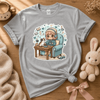 Cat Cozy Nook cute animal graphic t-shirt cozy flat lay in sport grey.