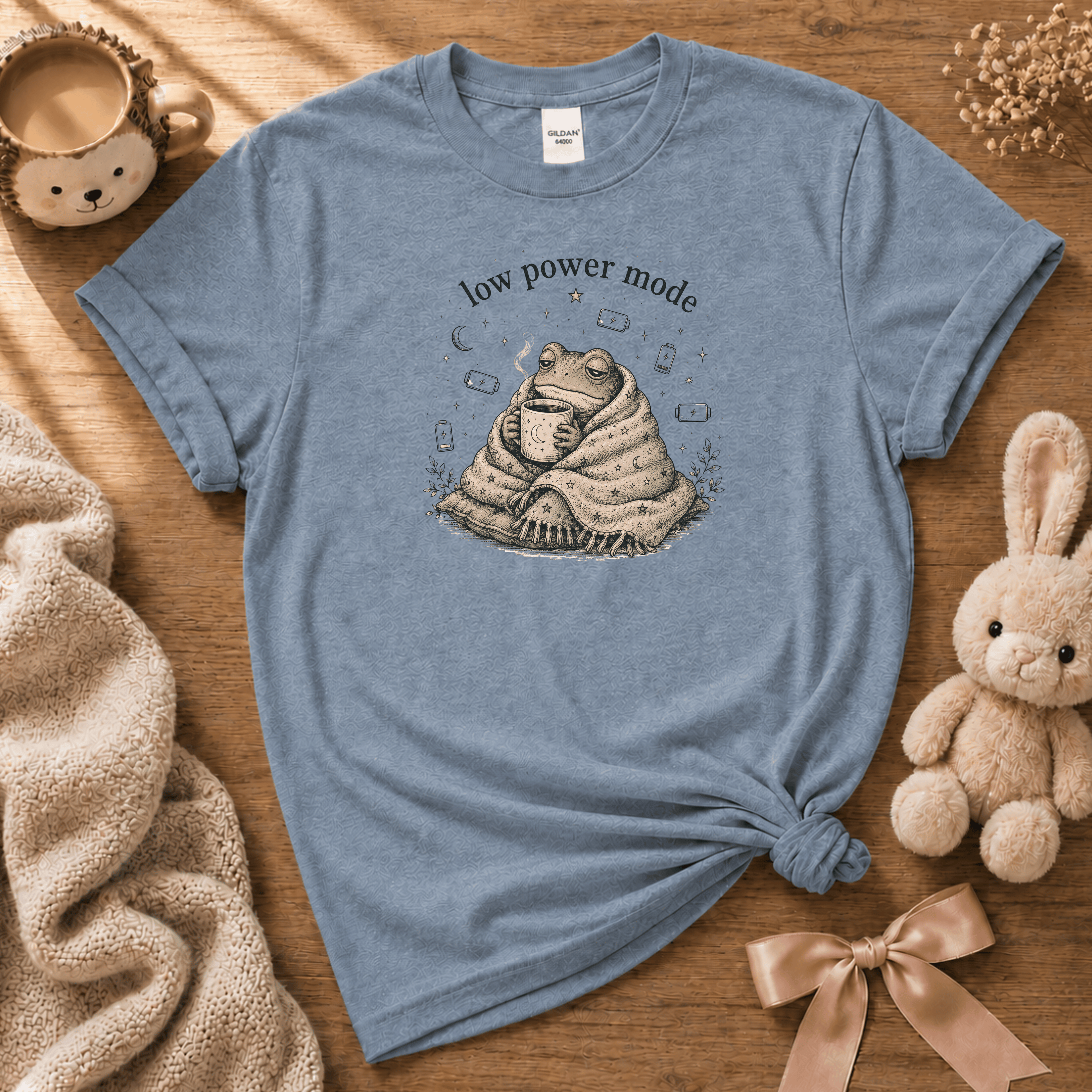 Low Power Mode cute animal graphic t-shirt cozy flat lay in stone blue.