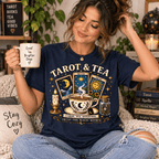 Woman holding a mug, wearing the Tarot & Tea Premium T-Shirt in navy