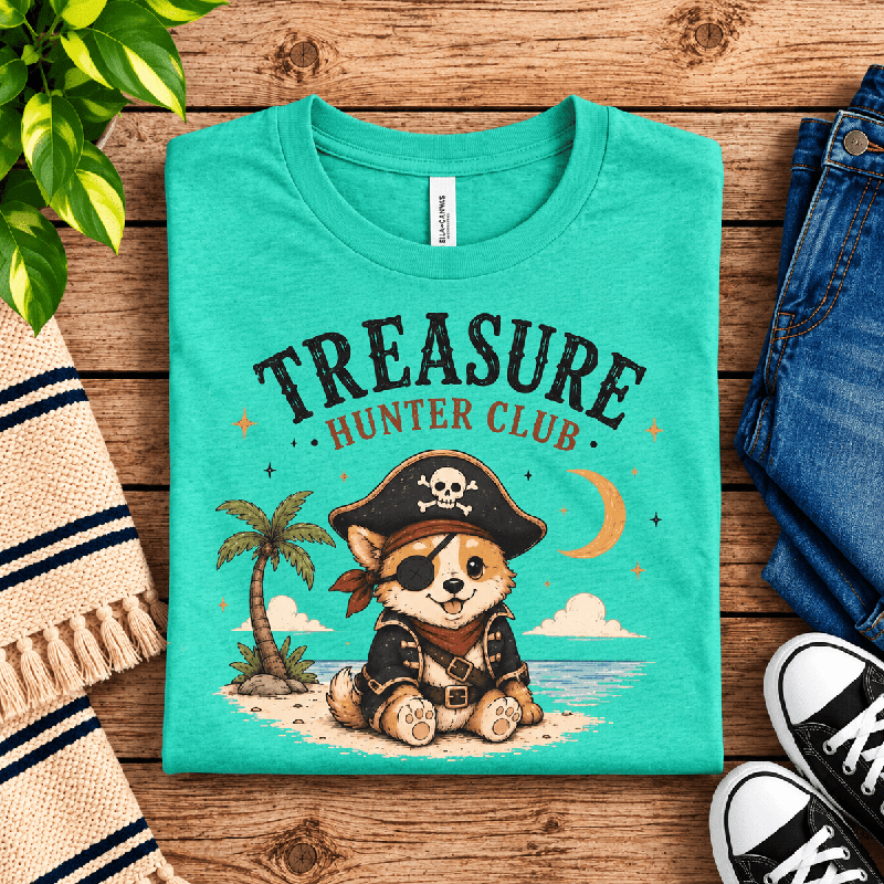 Treasure Hunter Club Premium T-Shirt in heather sea green, folded close-up with neck tag showing