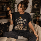Woman holding a mug, wearing the Voodoo & Hoodoo Premium T-Shirt in vintage black