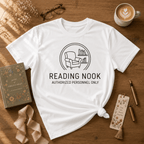 Reading Nook book lover graphic t-shirt cozy flat lay in white.