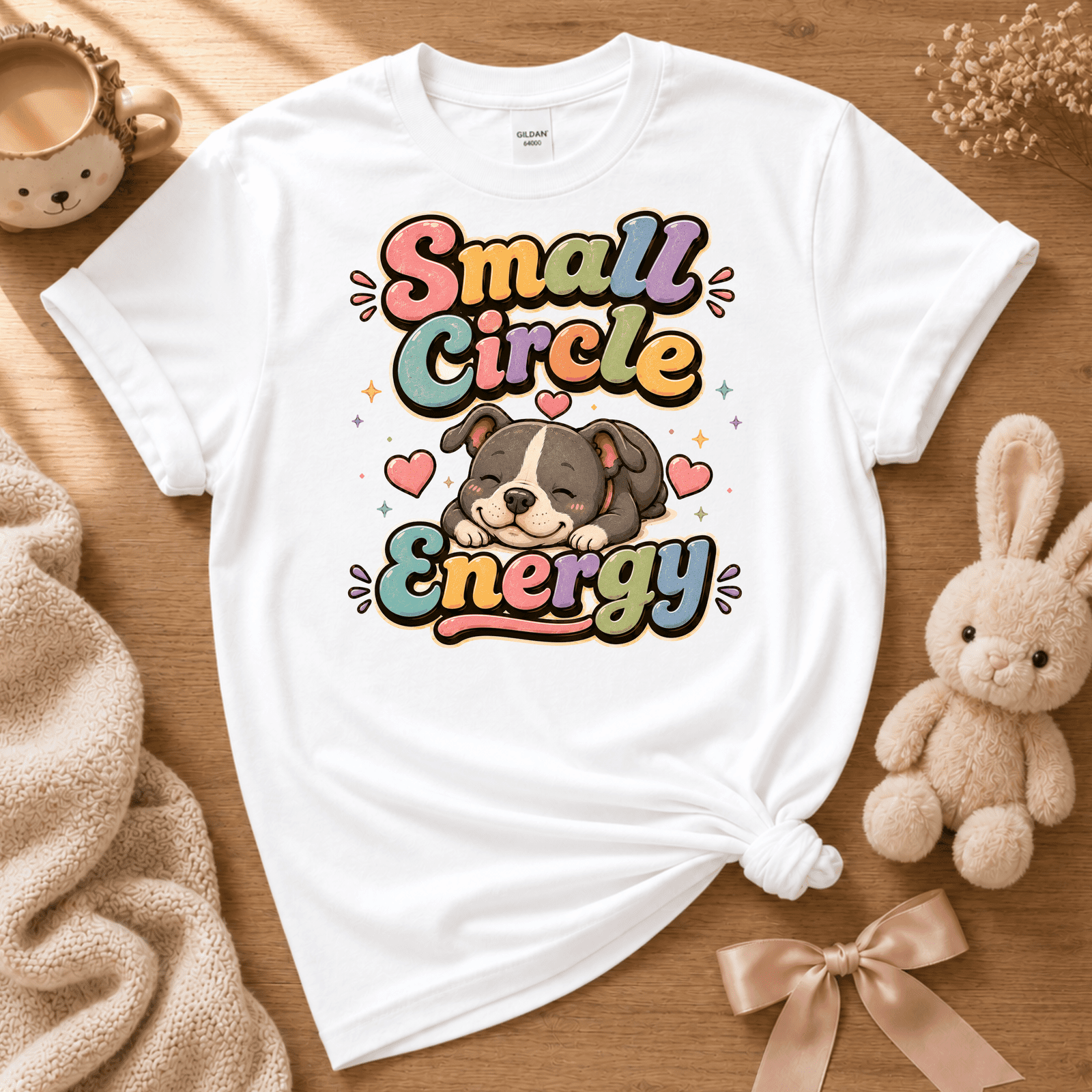Small Circle Energy cute animal graphic t-shirt displayed in a cozy flat lay in white.