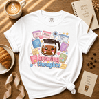 Brewing Thoughts coffee lovers graphic t-shirt cozy flat lay in white.