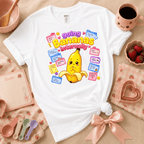 Going Bananas kawaii cute fruit graphic t-shirt displayed in a cozy flat lay in white.
