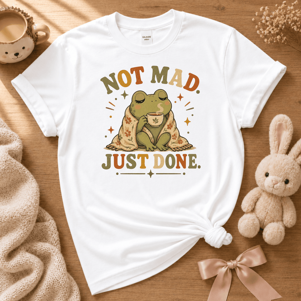 Just Done cute animal graphic t-shirt displayed in a cozy flat lay in white.