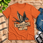 Winging It Premium T-Shirt in burnt orange, flat lay